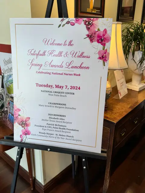 Catholic Charities and the Annual Interfaith Health and Wellness Awards sign